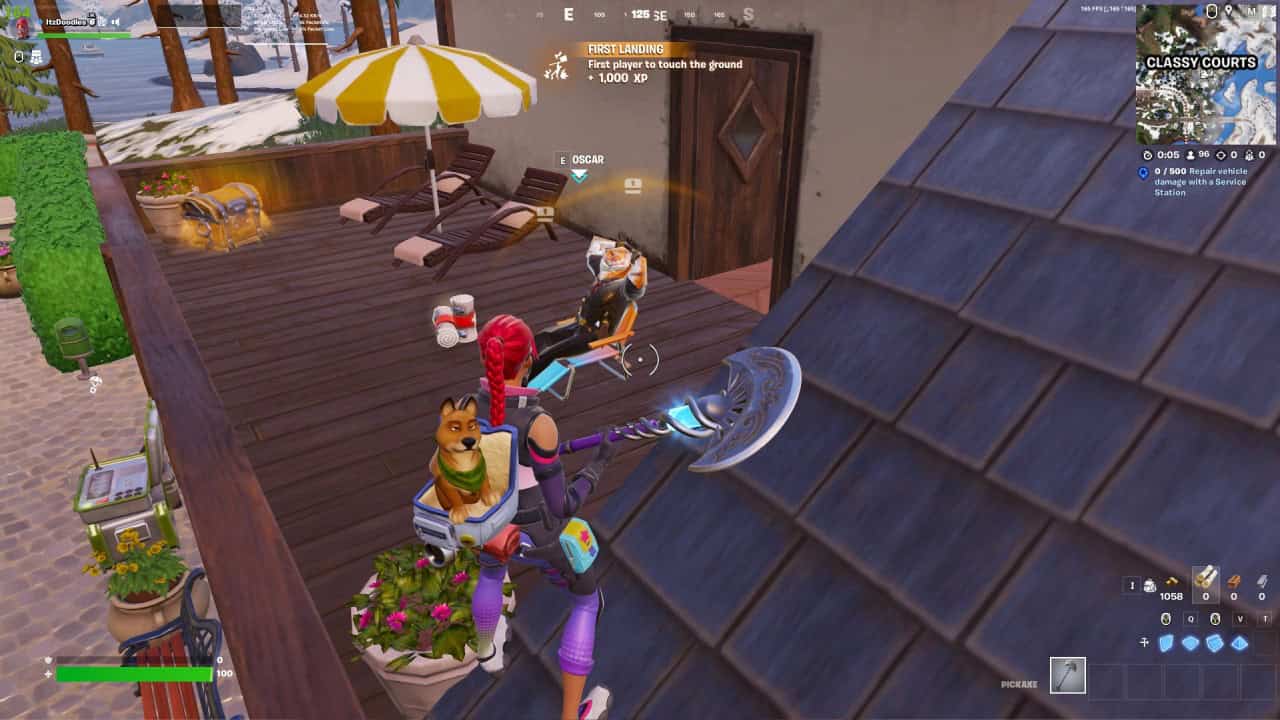A player with a red-haired character holding a blue axe stands near a rooftop in Fortnite Chapter 5, Season 3. Another character, Oscar, sits in a chair on a patio next to a chest. A yellow and white umbrella and lounge chairs are visible.