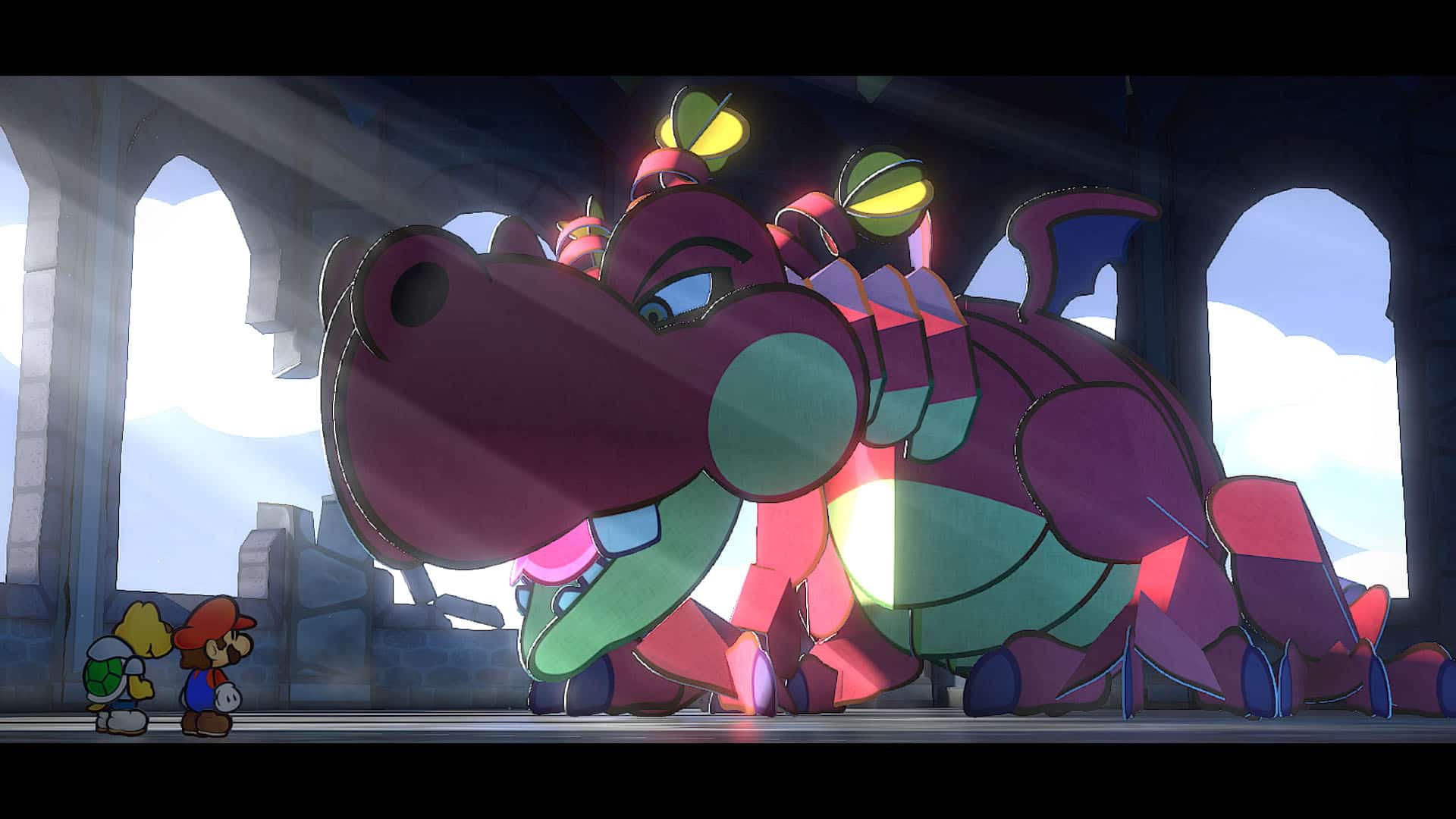 Paper Mario remake release time - mario looks at a pink paper dragon with big teeth