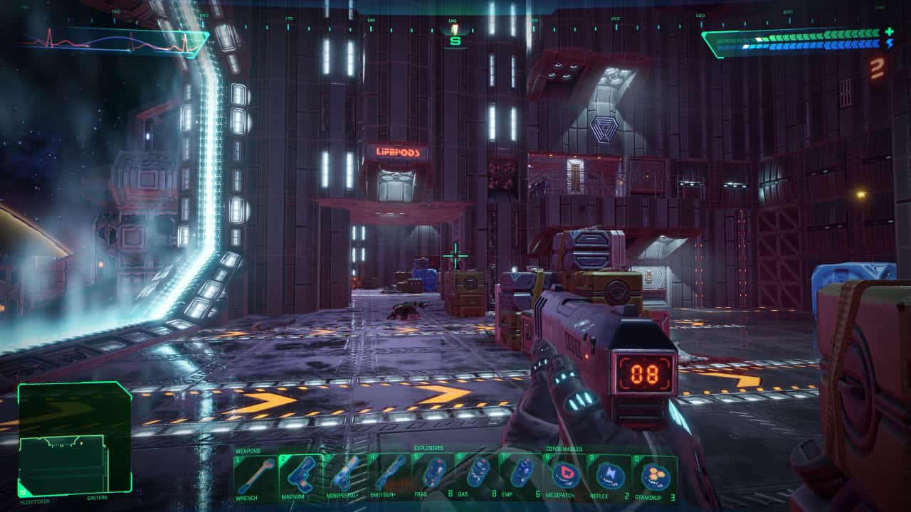 System Shock review: Player looks down across the hanger bays on the Flight Deck.