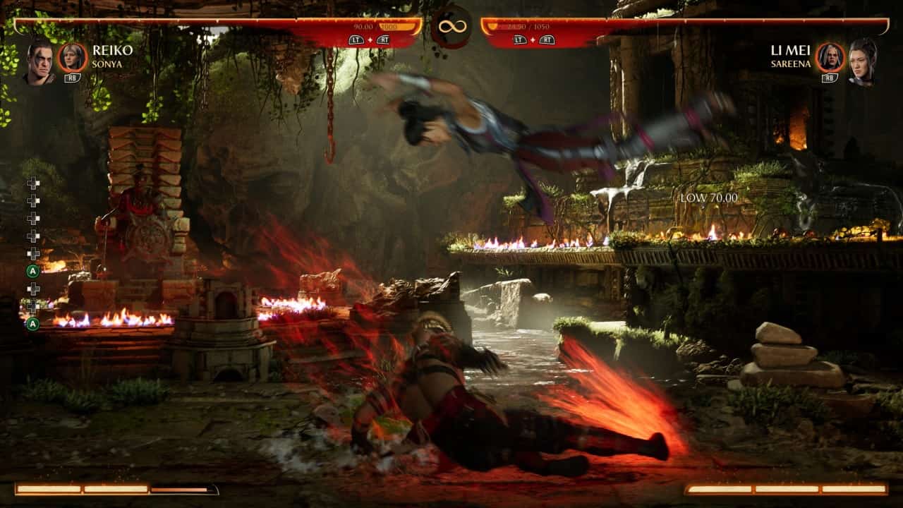 Mortal Kombat 1 Reiko: An image of Reiko fighting Li Mei in the game.