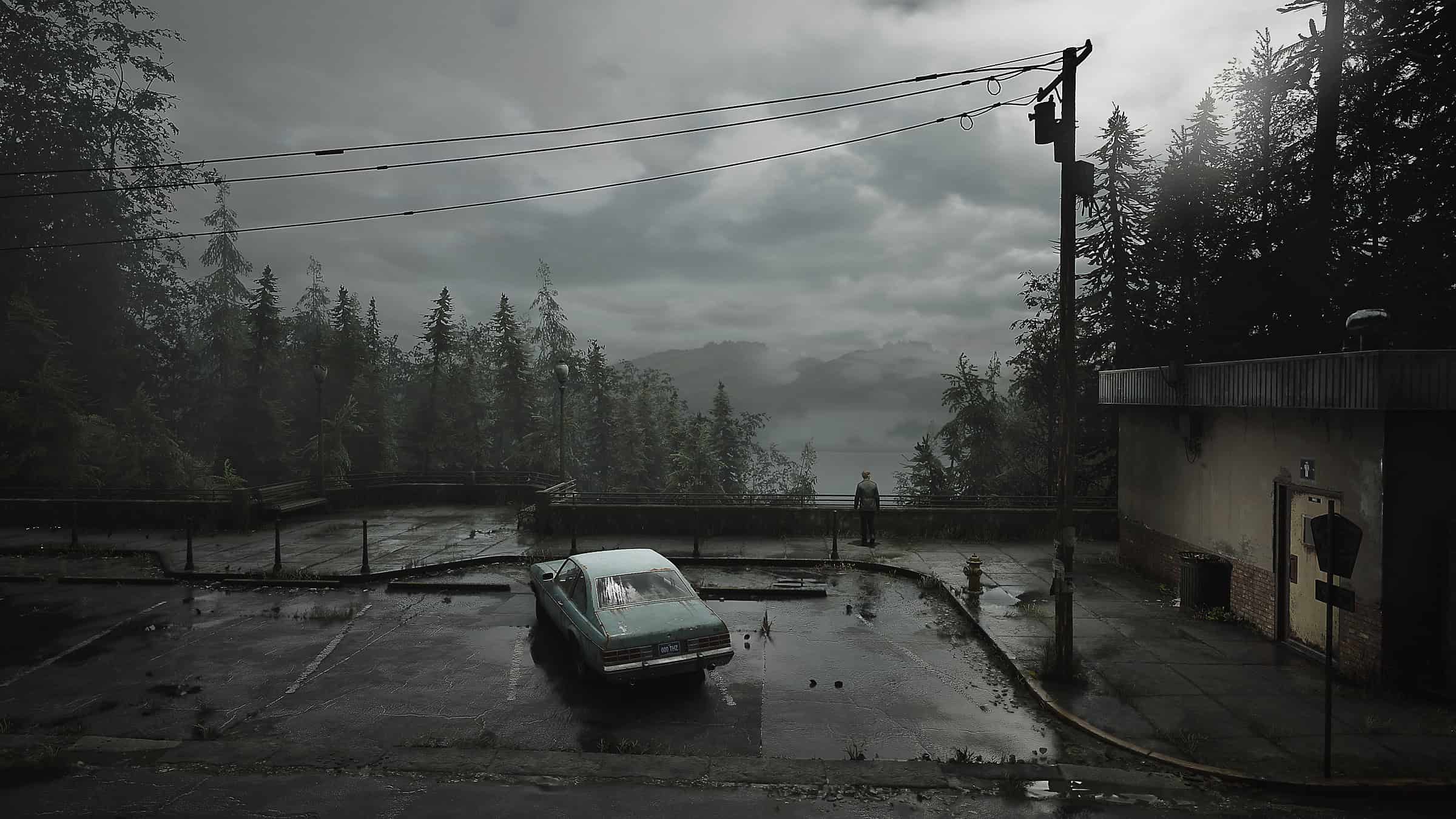 silent hill 2 remake release date - a lone car parked in a rundown lot