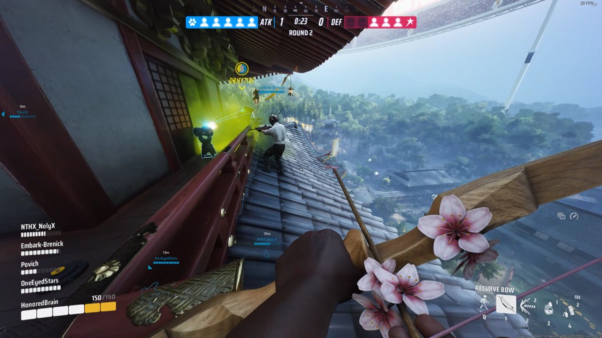 Players stand on top of a pagoda as they fight near an objective point in Season 3 of The Finals.