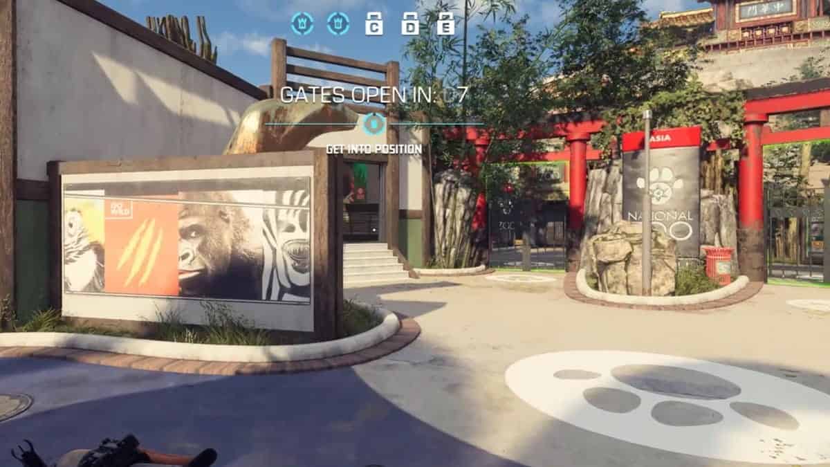Xdefiant maps: an in-game zoo environment with a countdown timer and objective: "GET INTO POSITION".